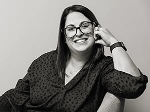 A black and white headshot of Alexia Kirkwood.