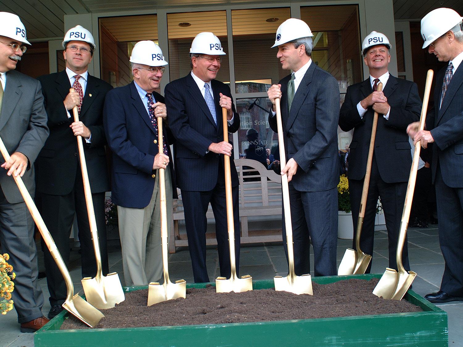 A photo of Jim Thomas and others at the groundbreaking for the IST Building.