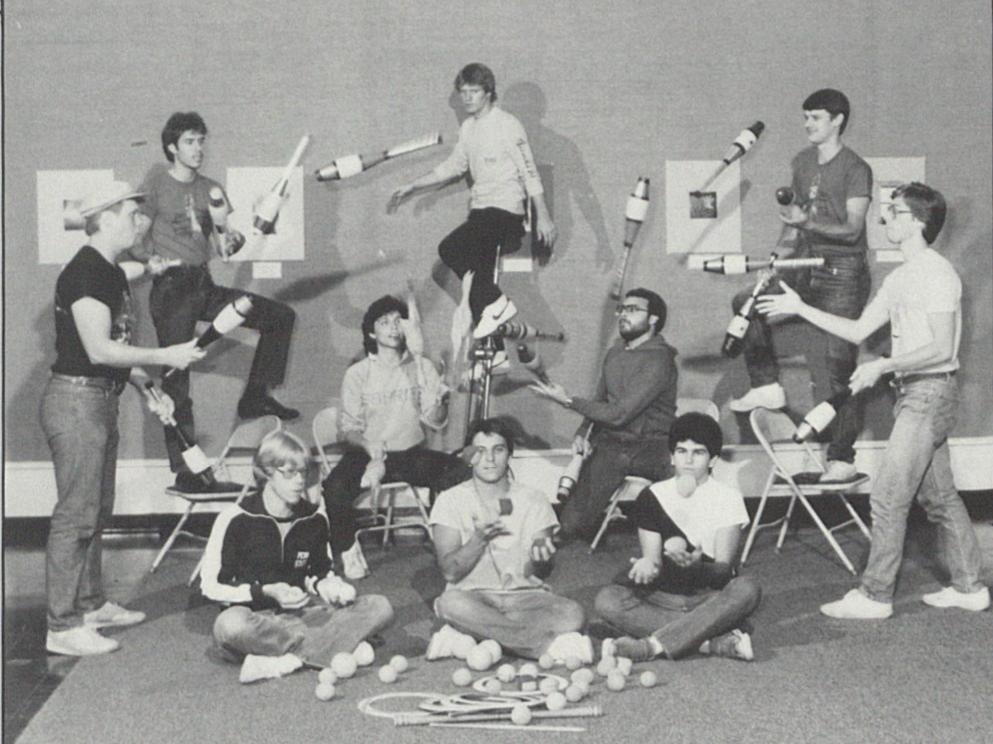 A black and white photo of student jugglers