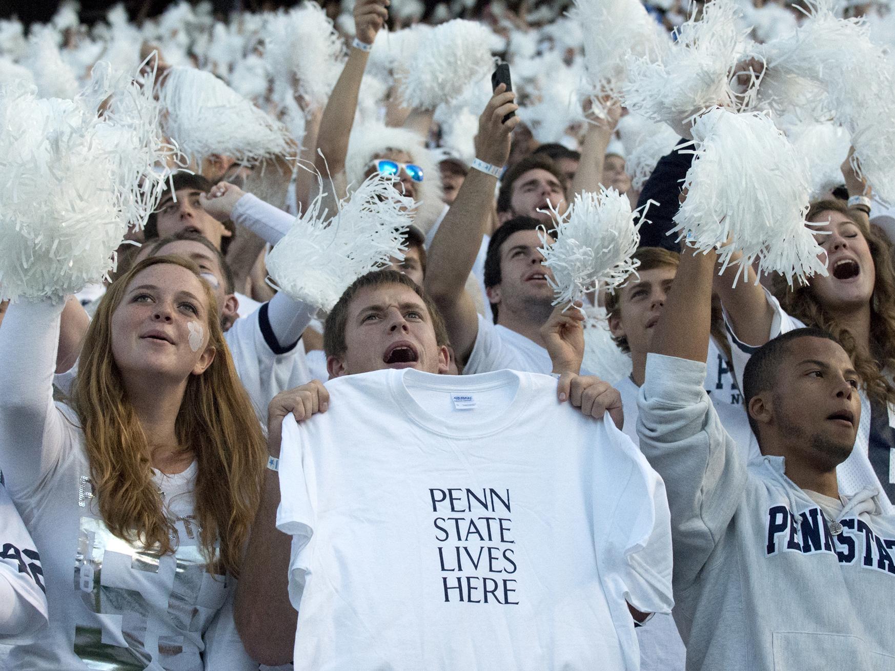 Student fans at a Penn State White Out game in 2013