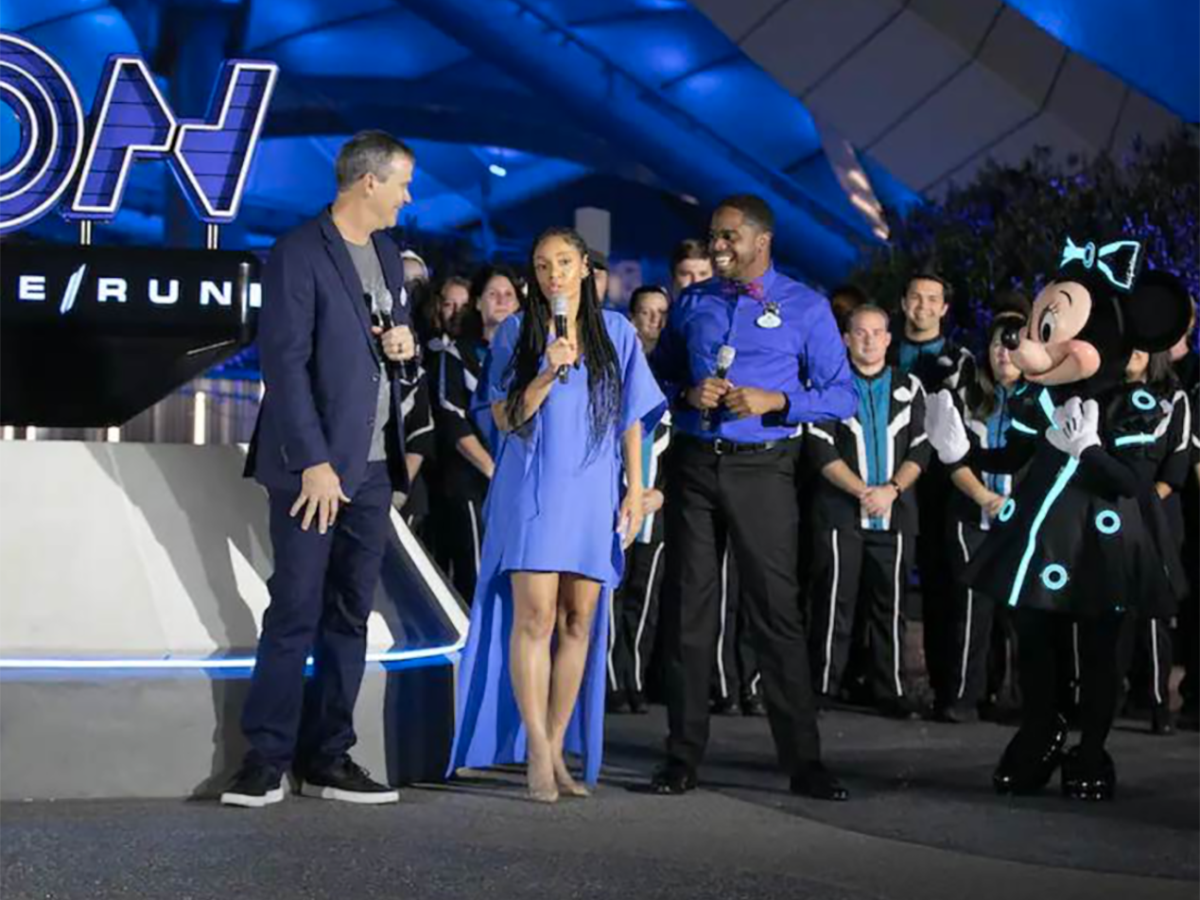 A photo of Faren Collins speaking at the unveiling of Disney's new Tron ride.