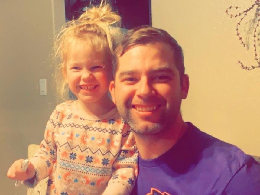 Sgt. Maj. Chris Nelson with his daughter