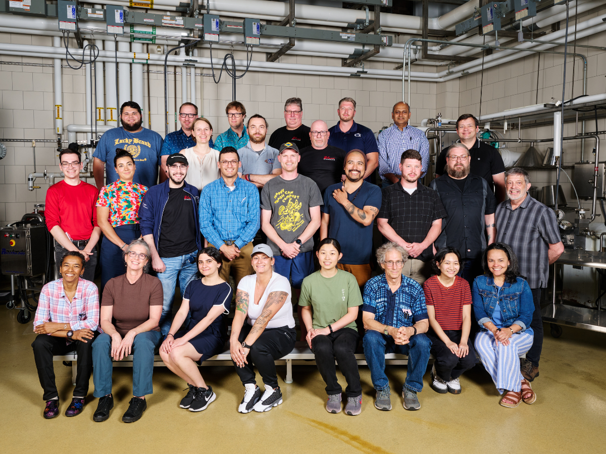 Attendees of Penn State's Chocolate Short course assembled and smiling at the camera