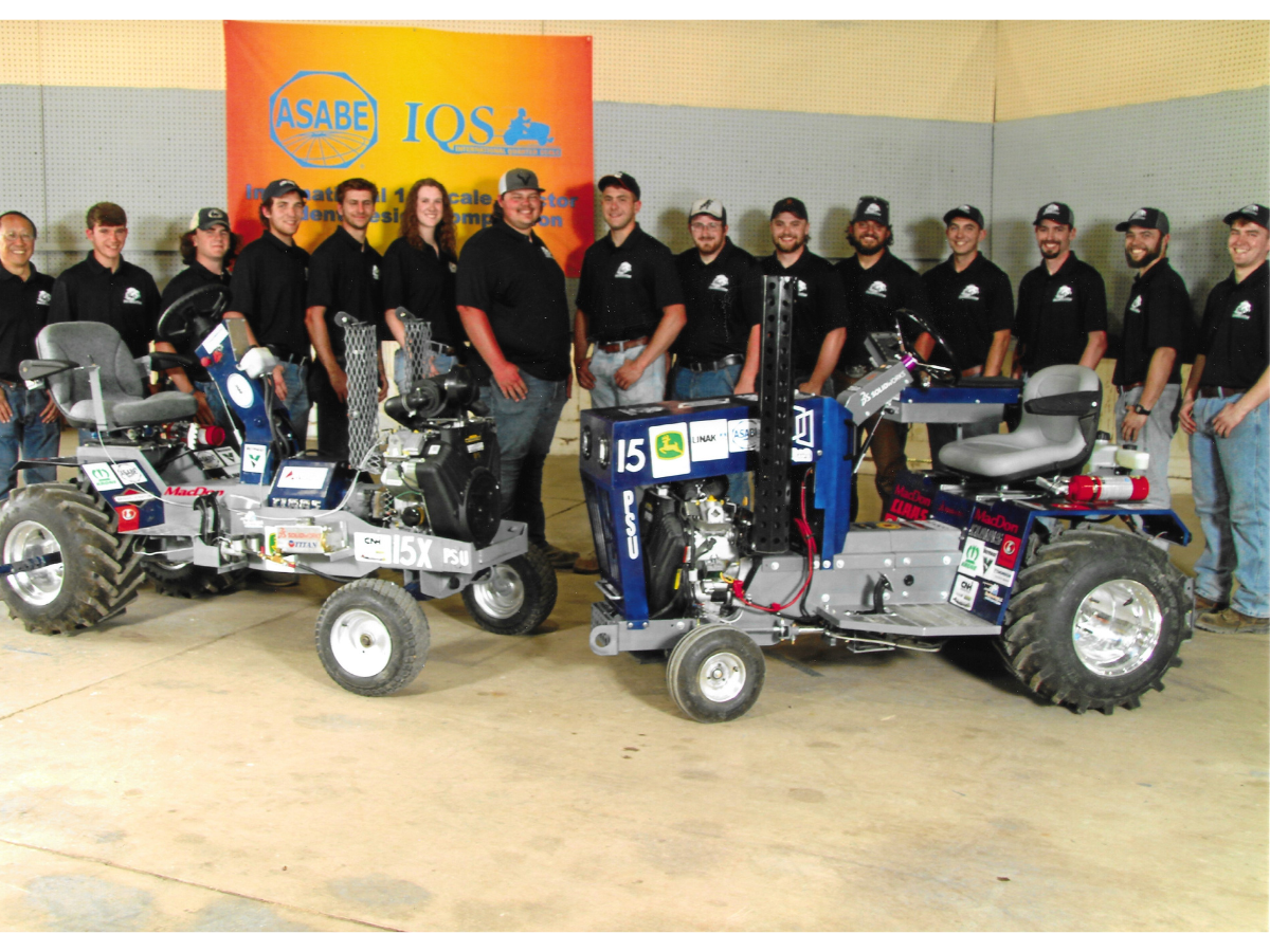 The members of the Pullers team lined up and smiling for the camera