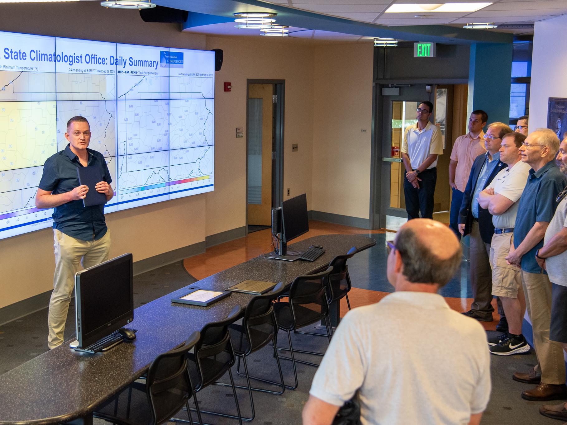 Numerous weather experts attend the ceremony where Penn State is honored for collecting more than 100 years of weather data.
