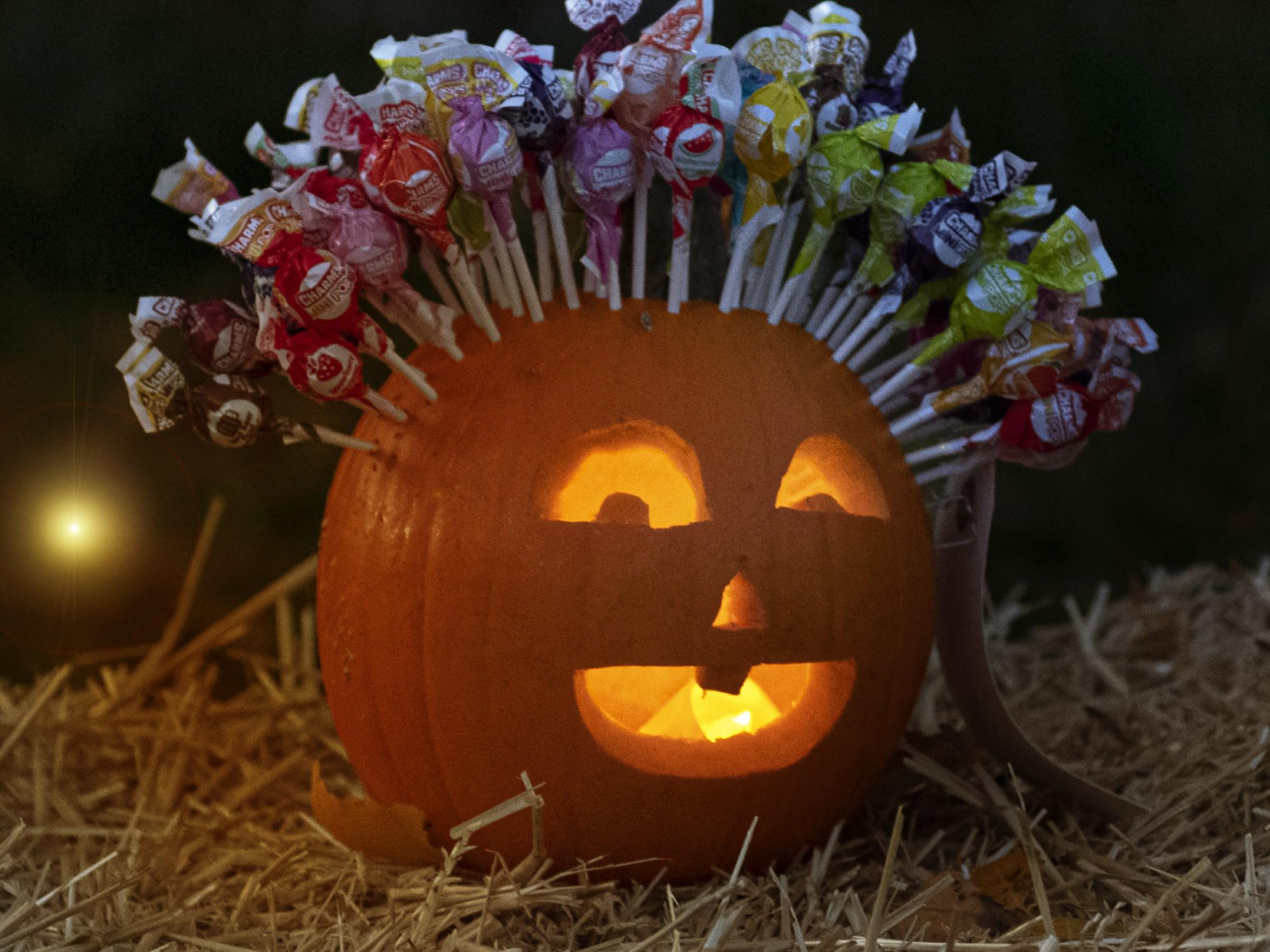 Lighted jack-o-lantern with lollipop hair