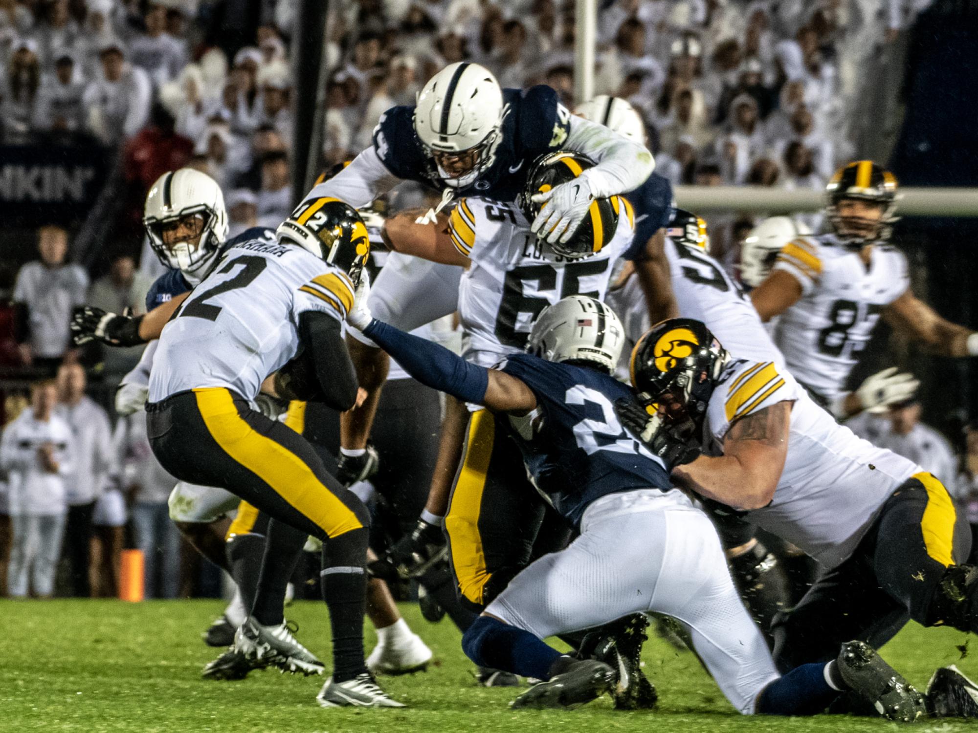 Defense swarms Iowa 