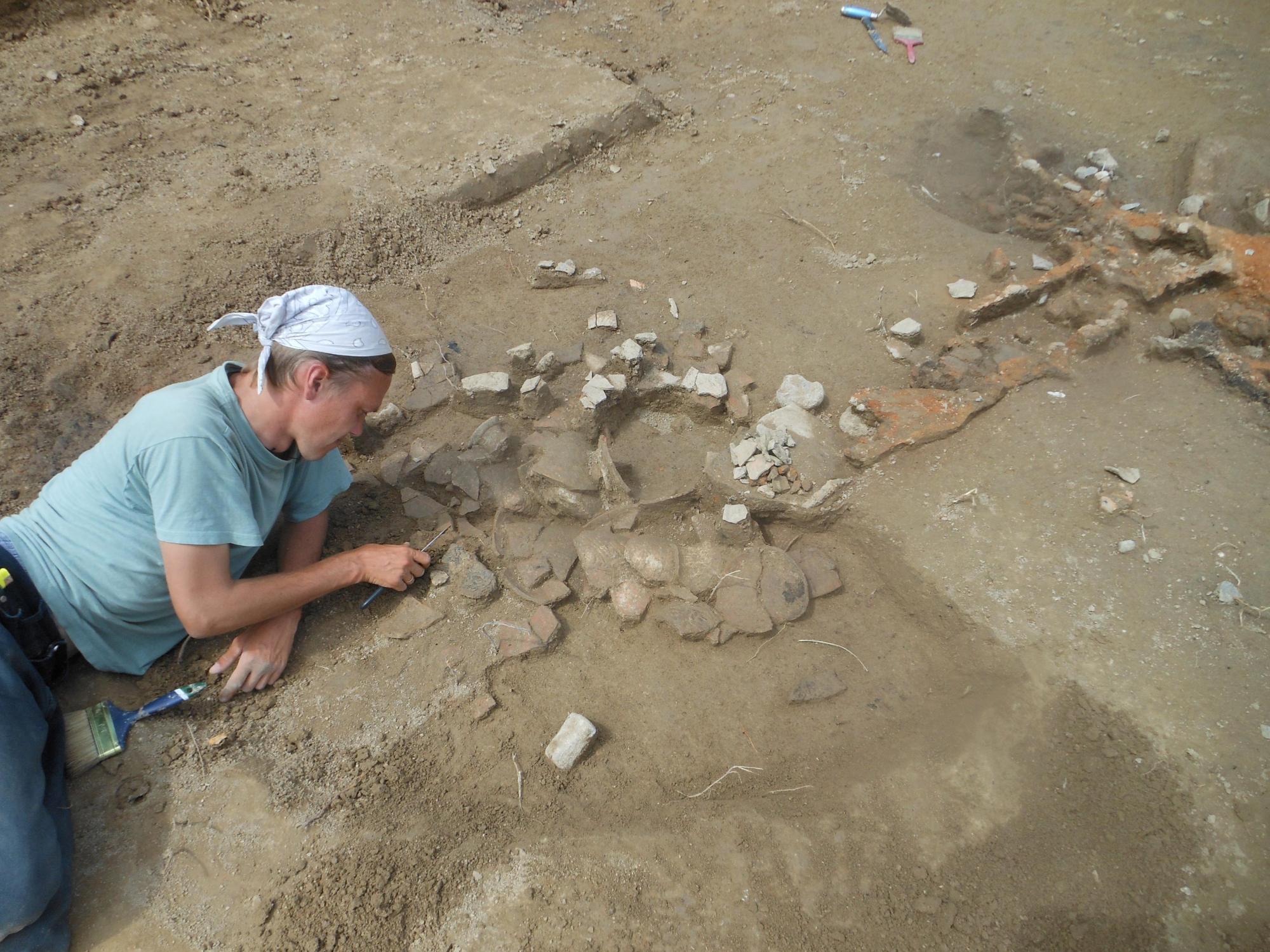 Man works at archaeological site 