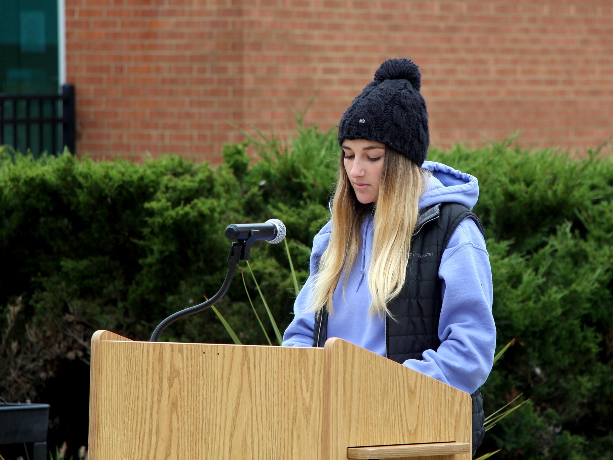 Third year student Lilia Lion reads a testimonial and shares her thoughts during the victimology event at Penn State DuBois.
