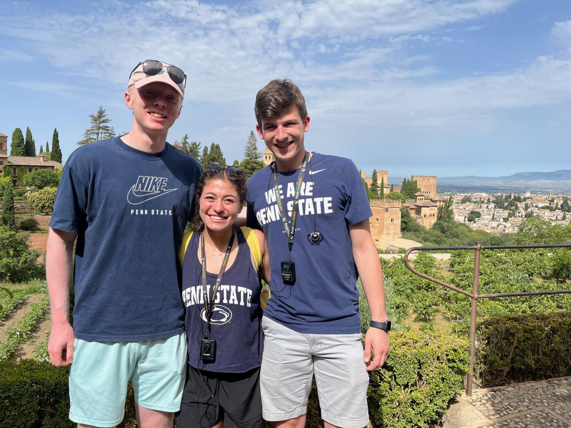 Zoe Feinberg, and her two friends, Alex [left] and Tyler [right] smile for a photo in Granada, Spain.