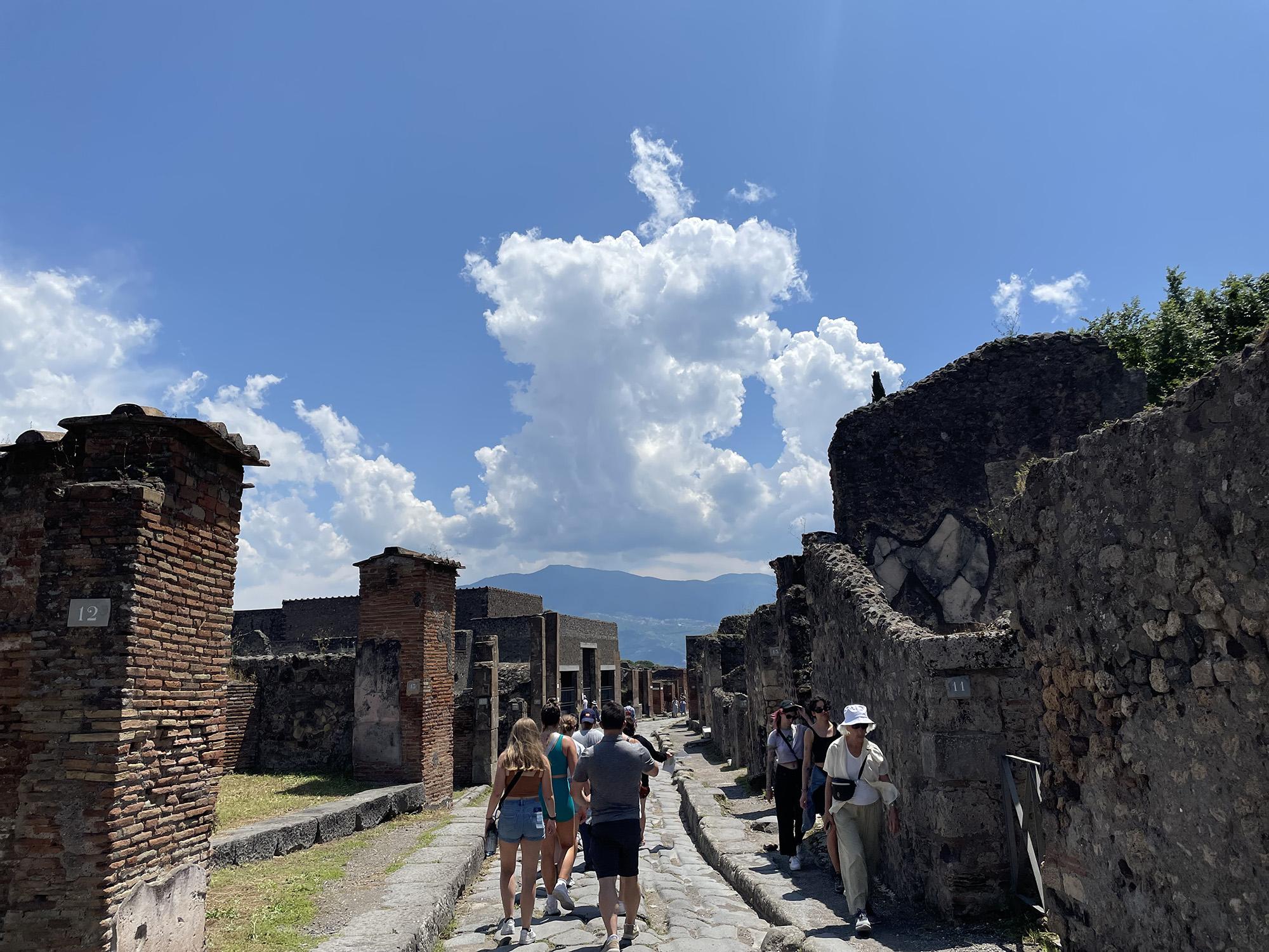 Students walk through the ruins of the Pompeii, Italy.