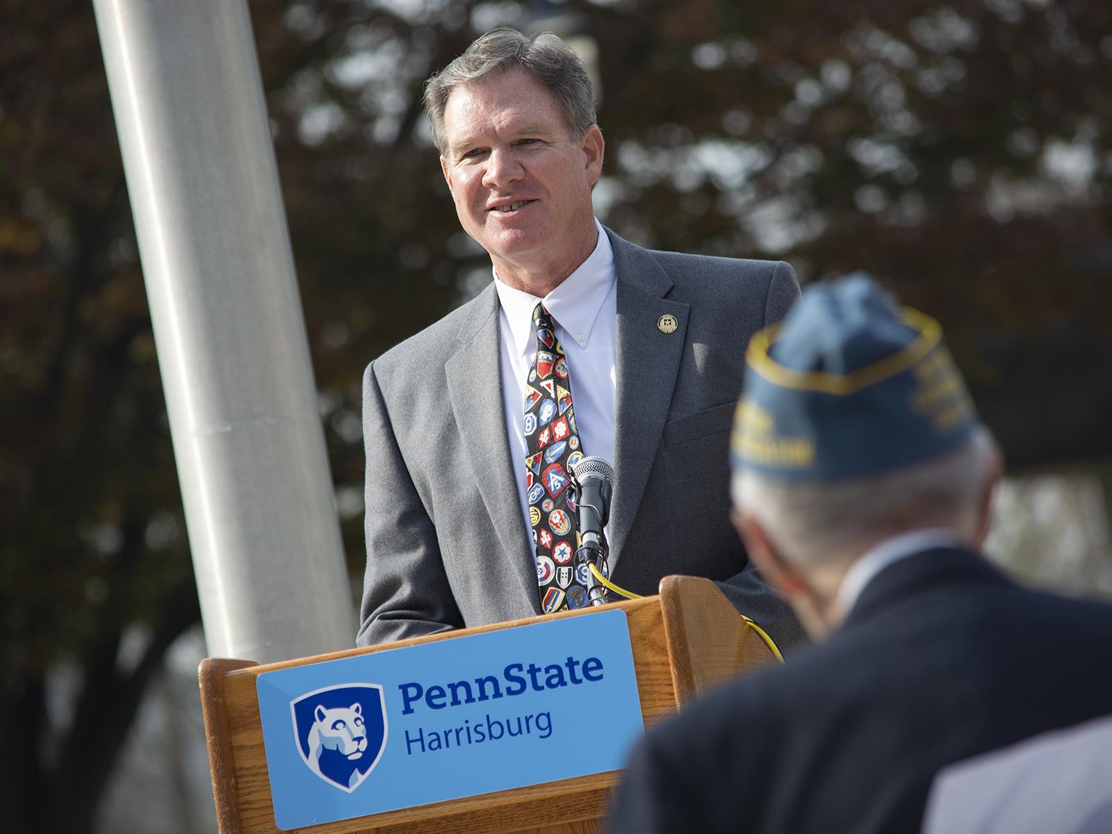 Doug Charney speaking at a Veterans Day ceremony