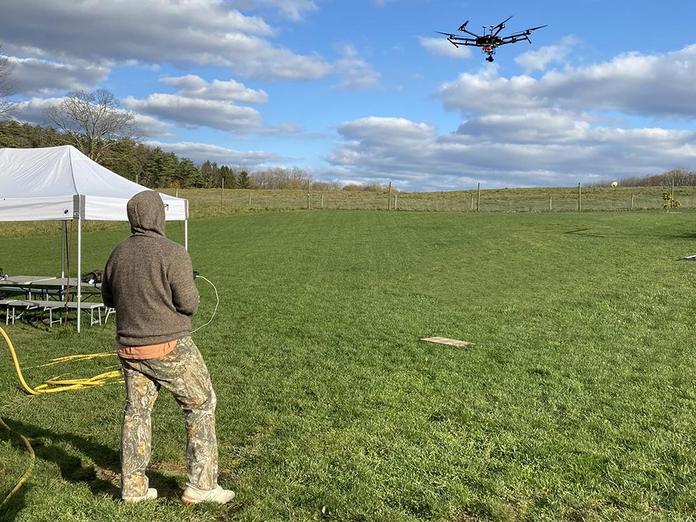flying drone in field