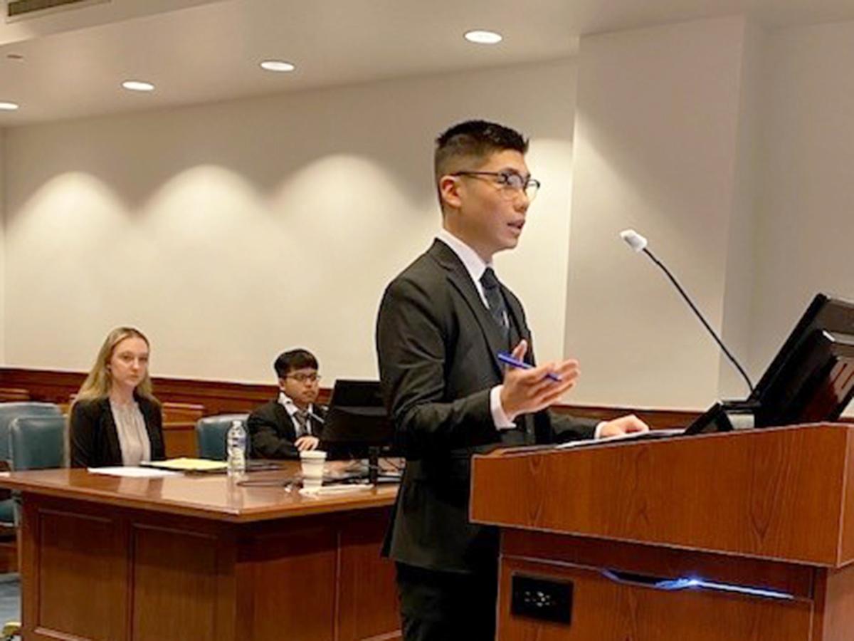 Will Lin (role: “federal prosecutor”) presenting his arguments in front of Judge Haines. 