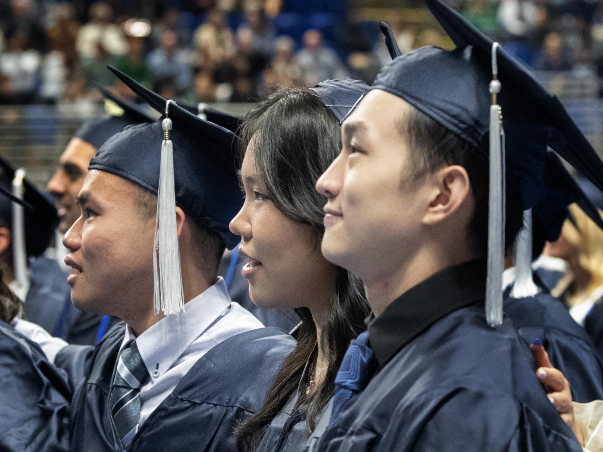 graduates during conferring of degrees