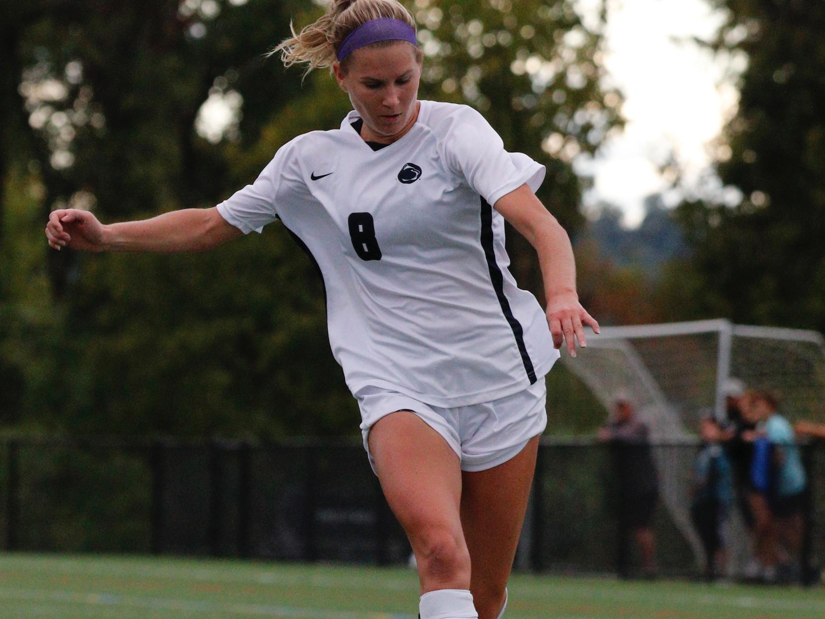 Kylee Altland playing soccer
