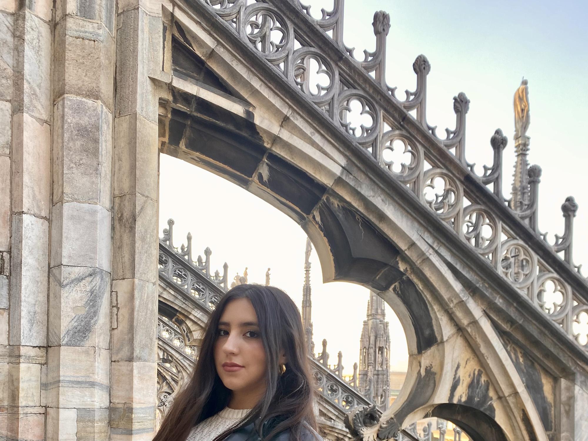 Nina Castillo Schoonewolff stands atop the Duomo di Milano.