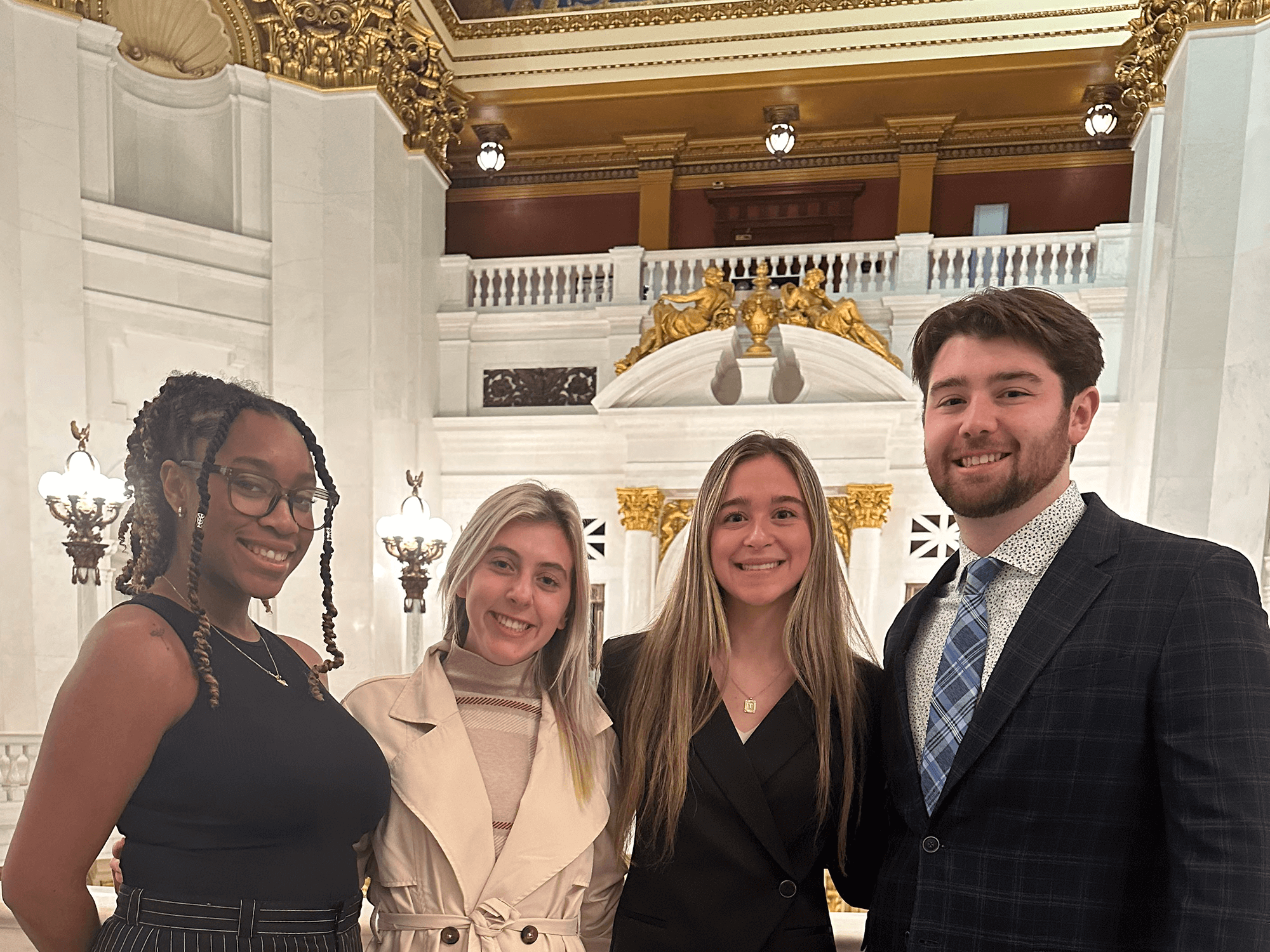 Reese Hays (far right) with other members of his pre-law fraternity Phi Alpha Delta — (left to right) Essence Henderson, Maddie Humphrey and Taylor Hall — at the Pennsylvania State Capitol.