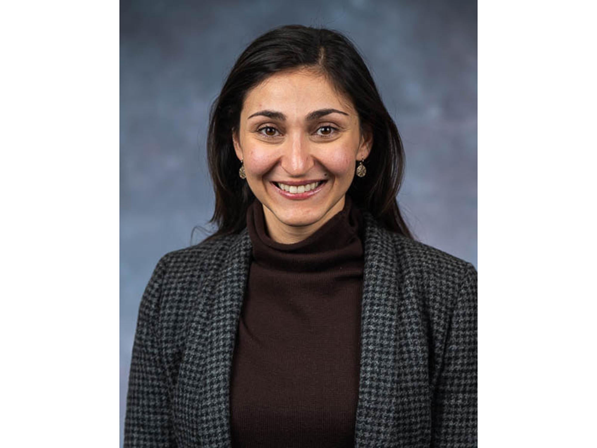 A portrait of Emily Masghati, an assistant professor of history at Penn State Behrend