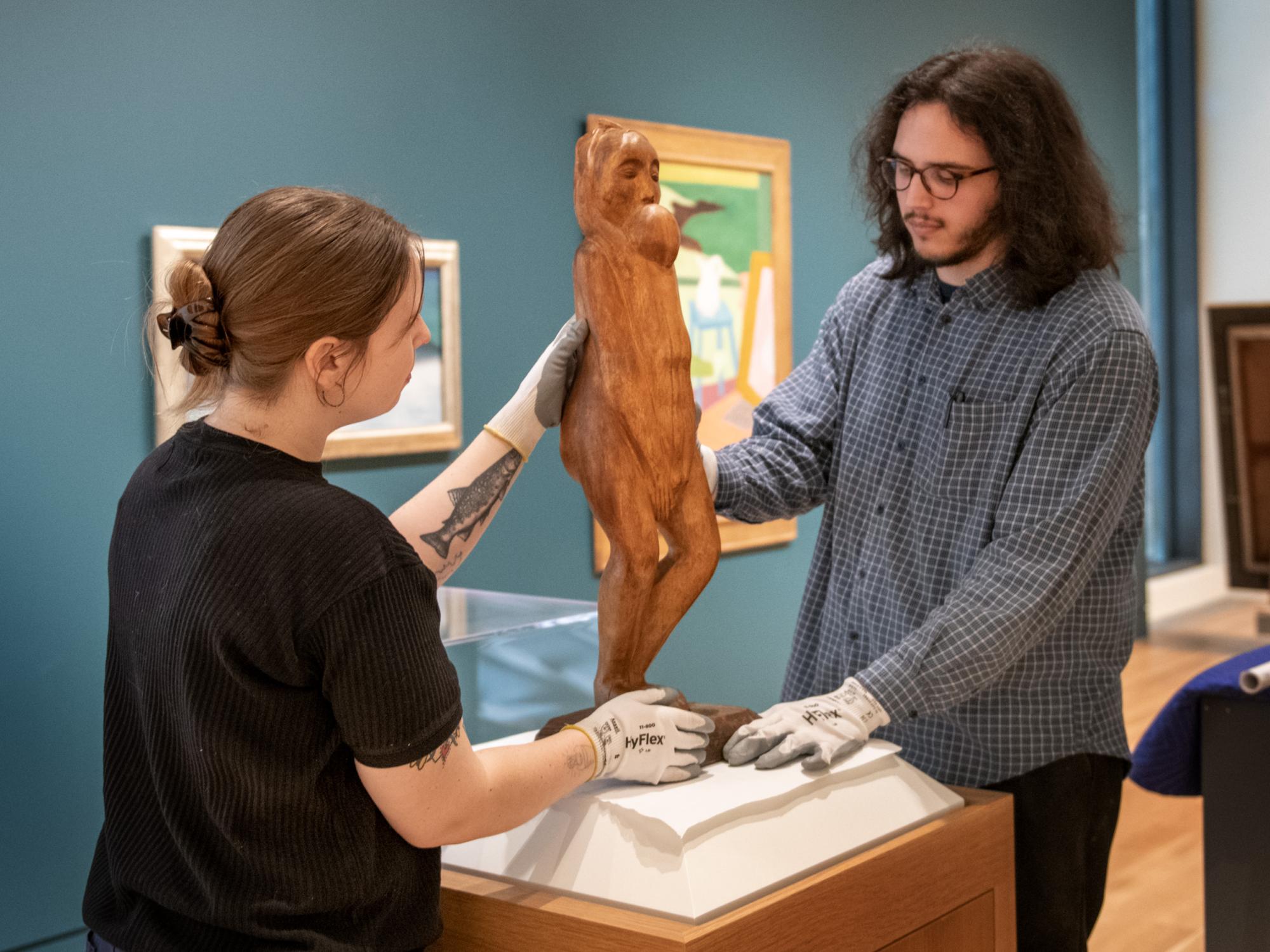 placing art in place at museum