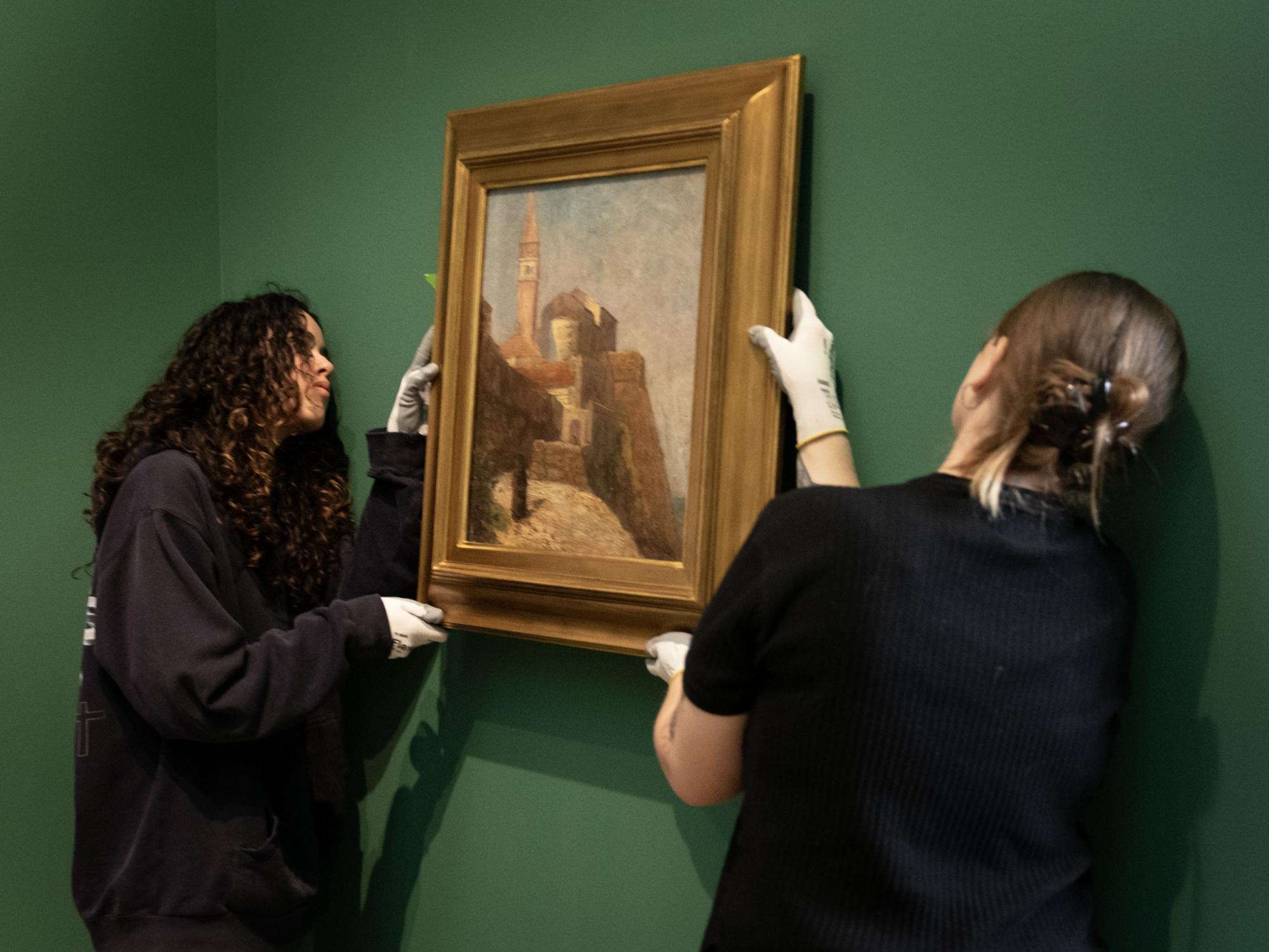 hanging painting at Palmer Museum