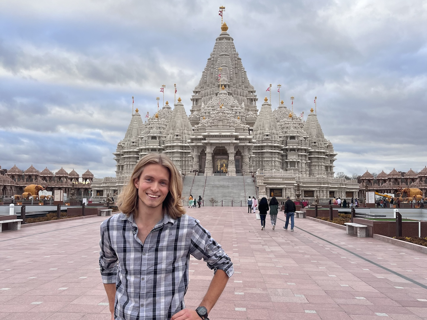 Victor Frolenko stands in front of the Hindu temple BAPS Swaminarayan Akshardham in Robbinsville, New Jersey. 