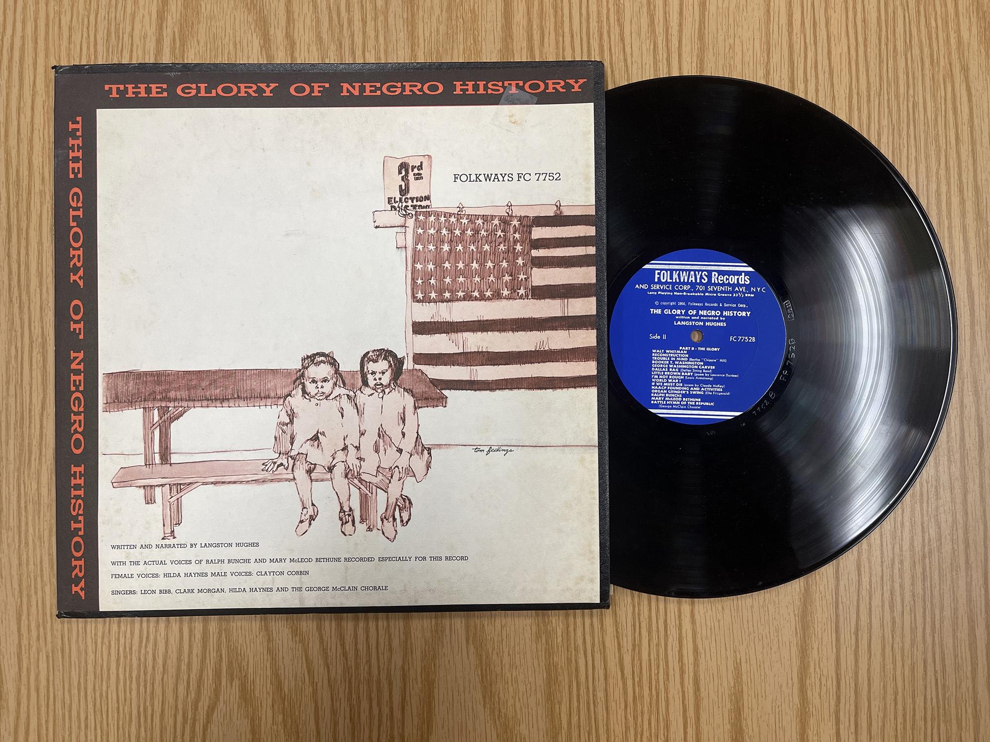 A record partially removed from its protective sleeve