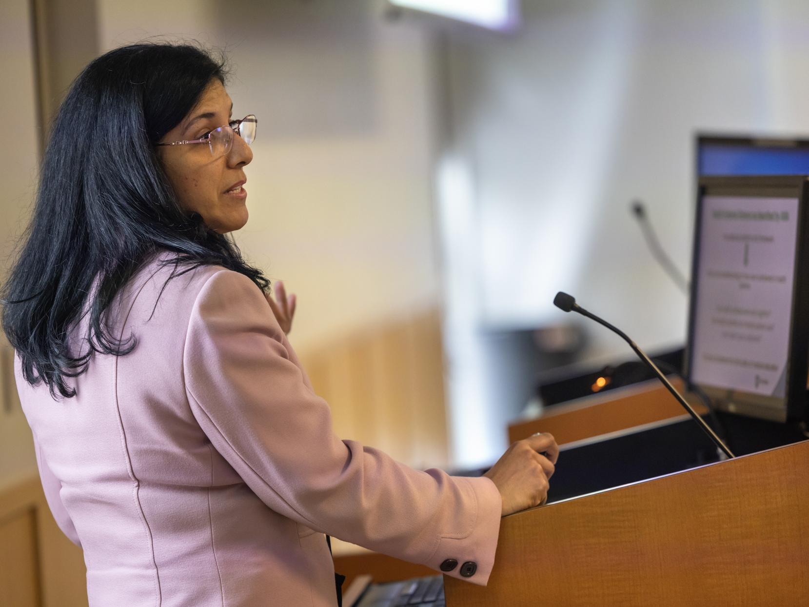 Dr. Ariana Pichardo-Lowden speaks at podium