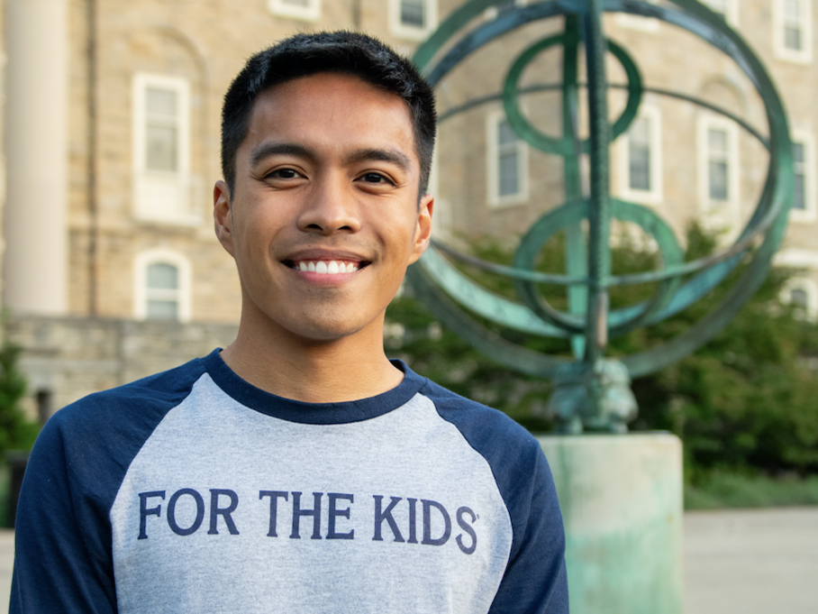 Jacob Santos in front of Old Main on Penn State's University Park campus
