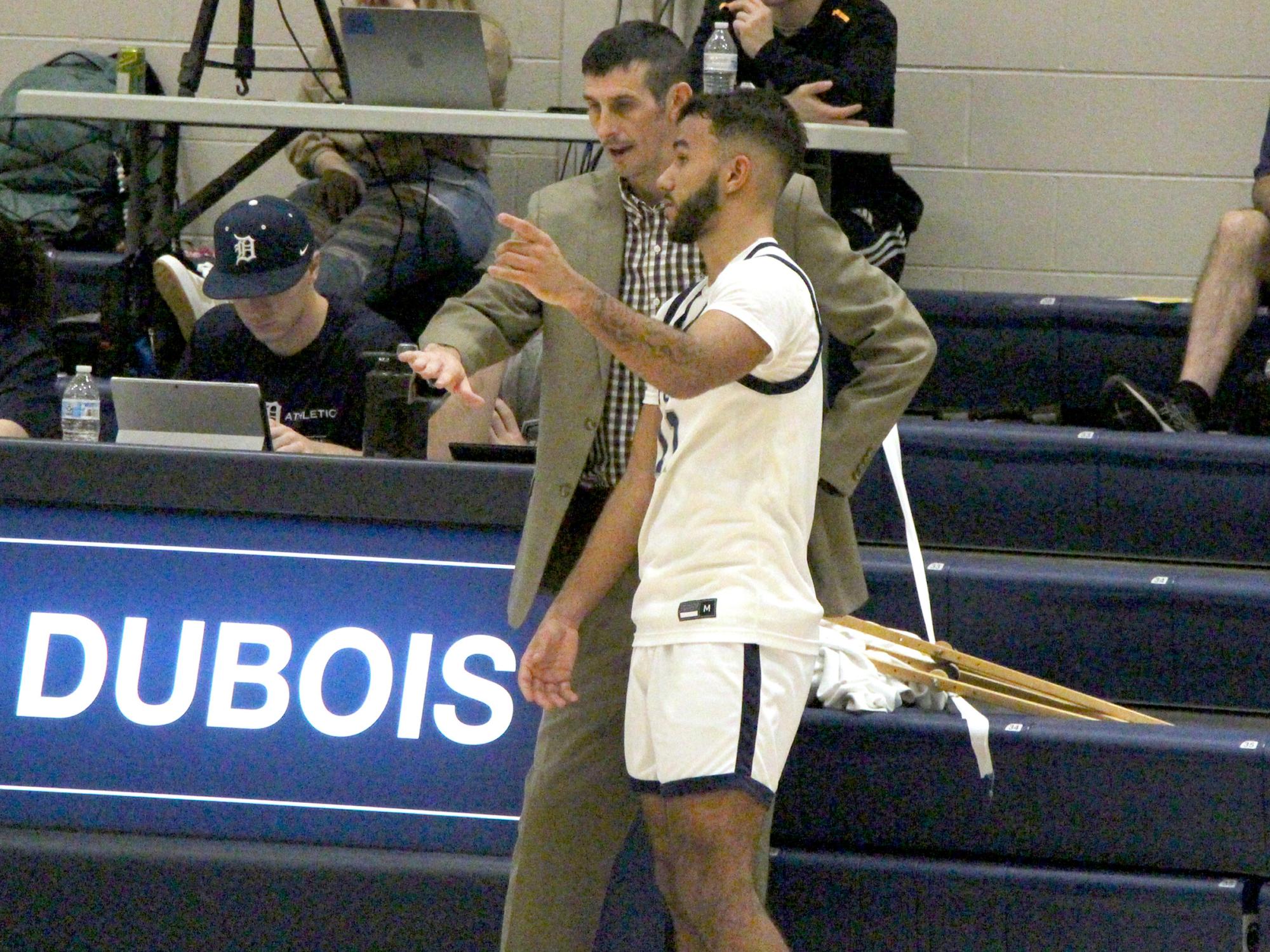 Penn State DuBois men’s basketball head coach Dan Smay discusses a defensive matchup with freshman Kaleb Pryor during a basketball game at the PAW Center this season. Smay was selected as the PSUAC men’s basketball coach of the year this season.