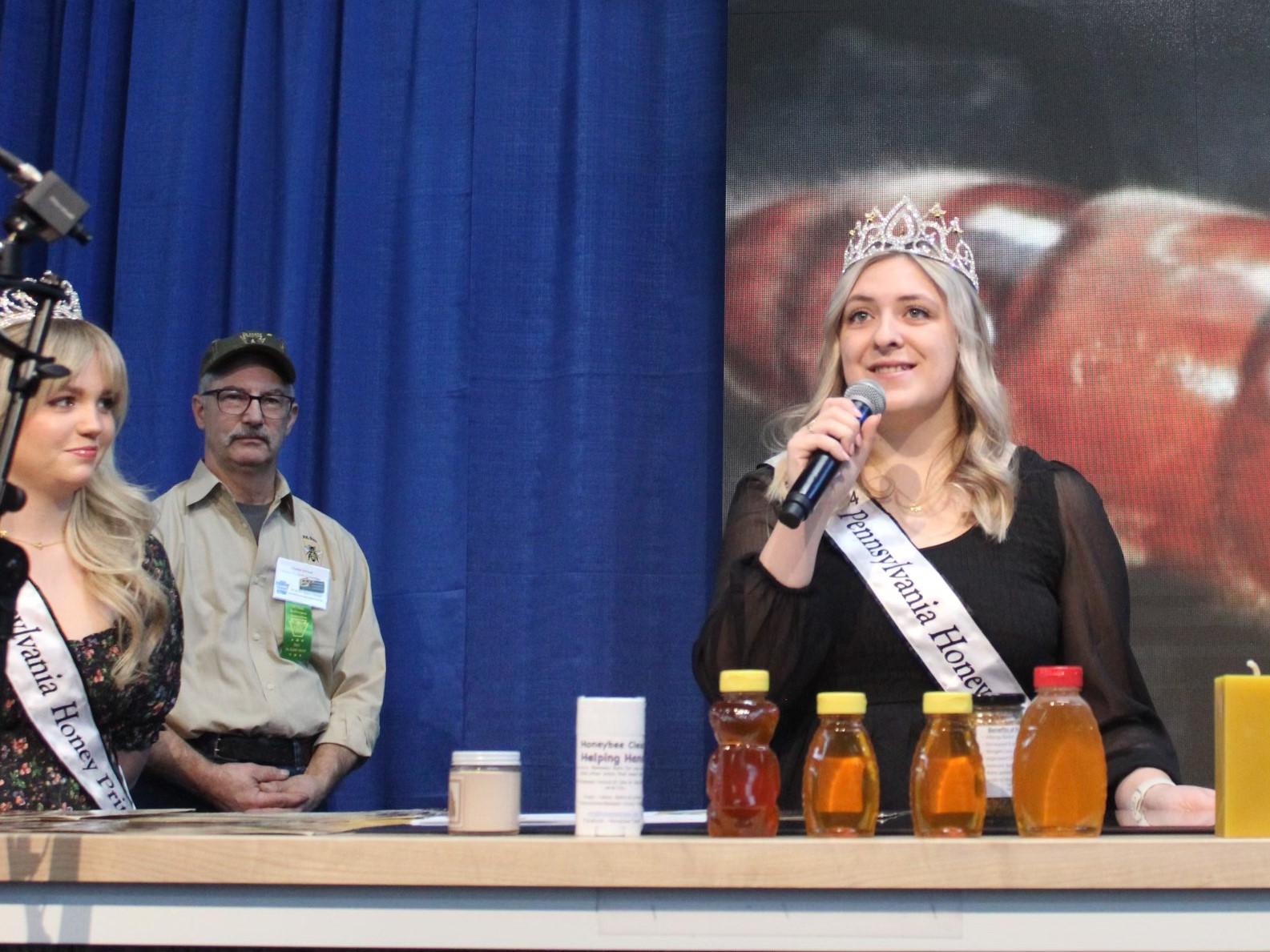 Cheyenne Bastian Brown talks into a microphone