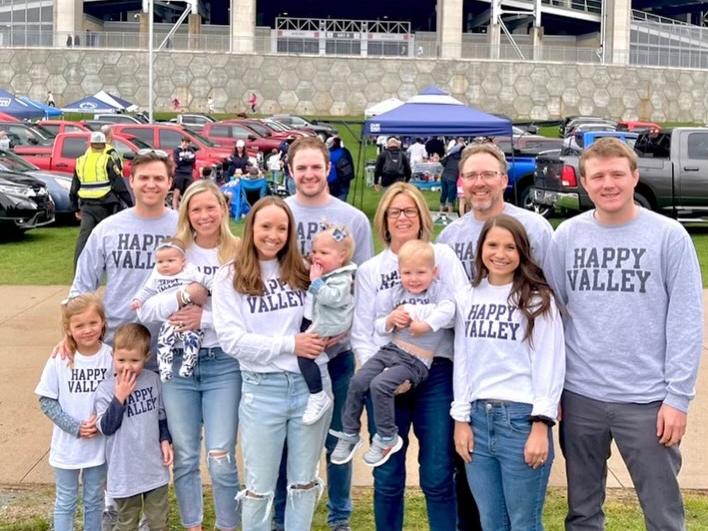 Taylor Nelson and his family at a tailgate outside Beaver Stadium at Penn State University Park