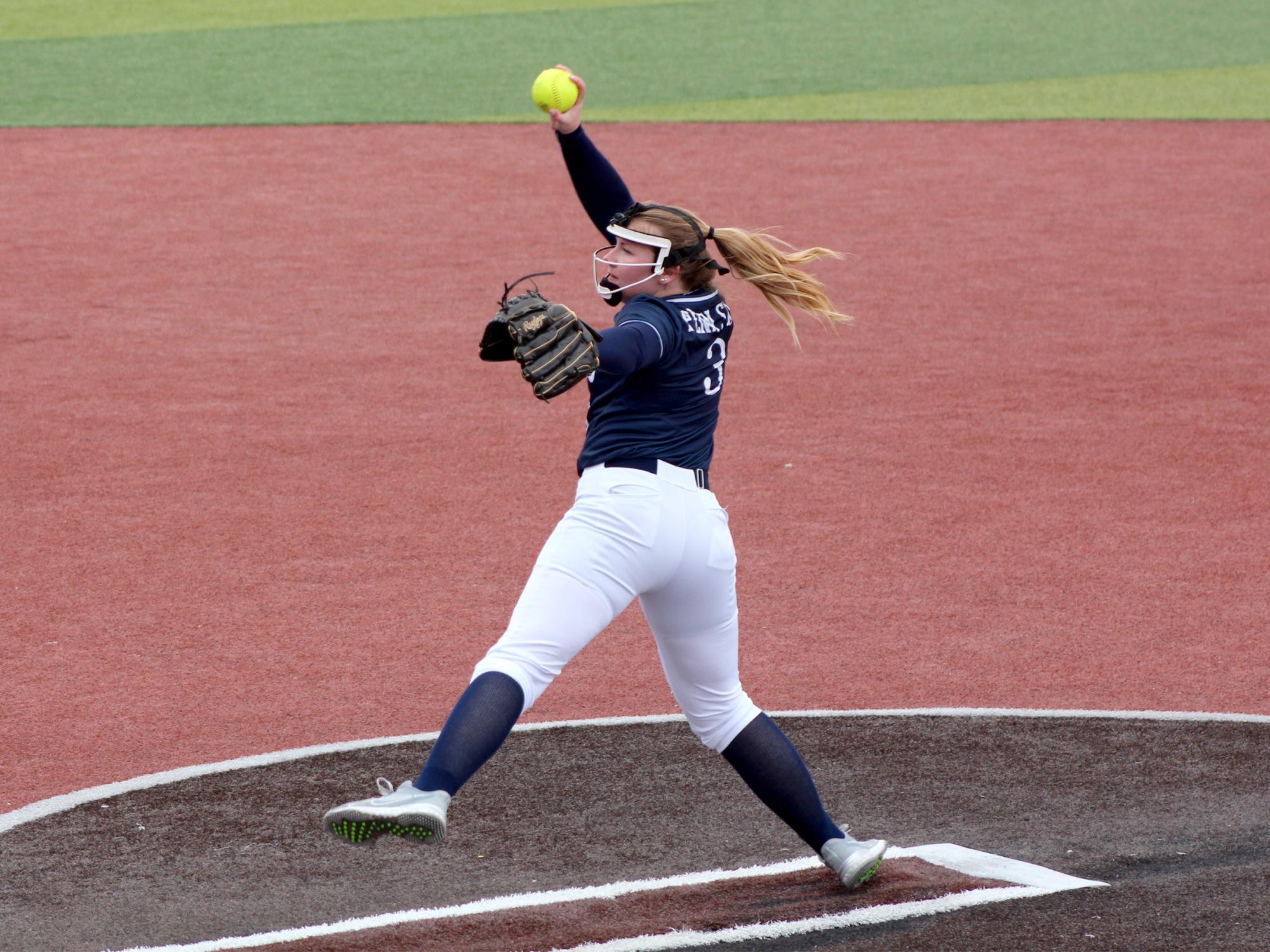 Penn State DuBois sophomore Megan Hyde works through her windup to deliver a pitch home during a recent home game at Heindl Field in DuBois.