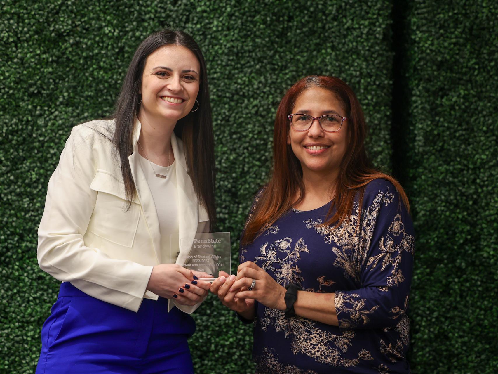 student accepting award
