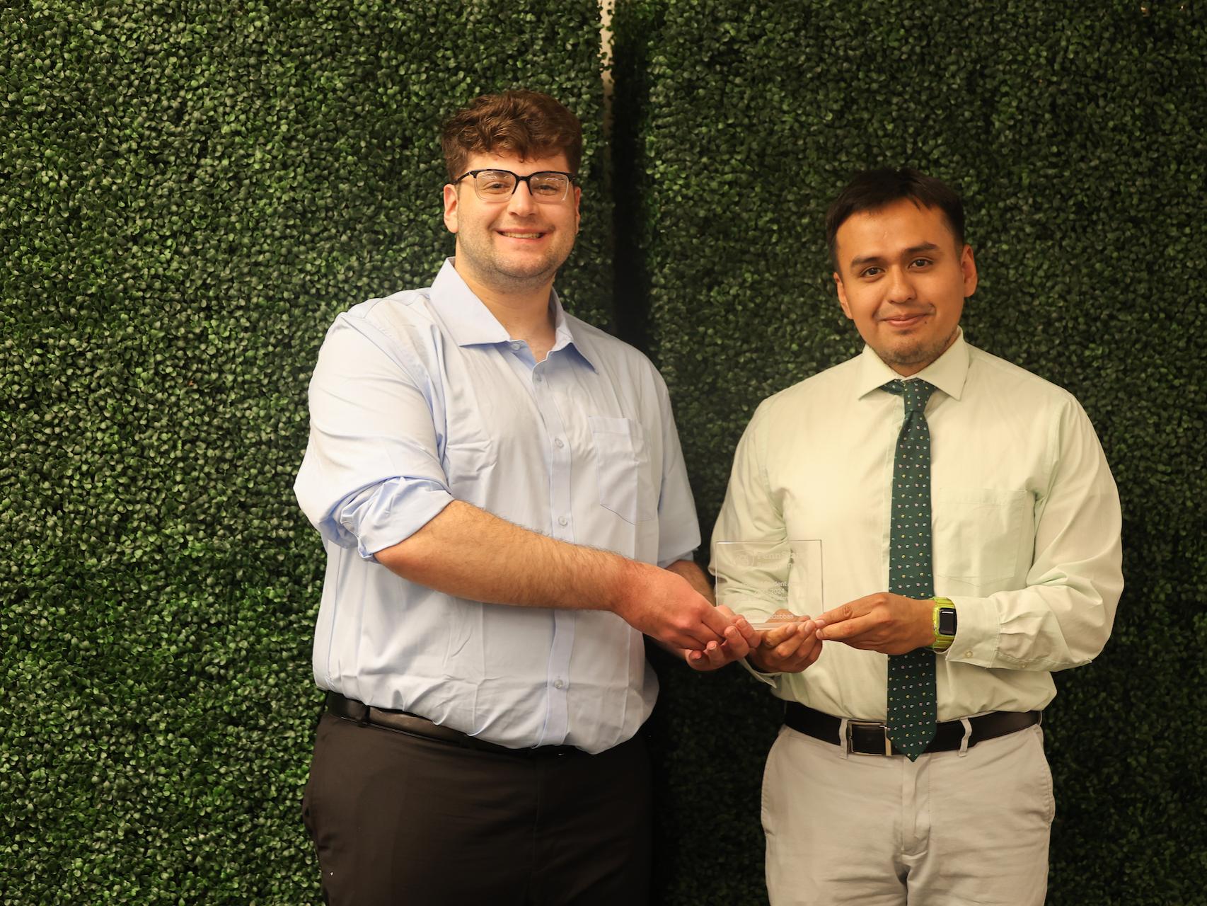 student accepting award