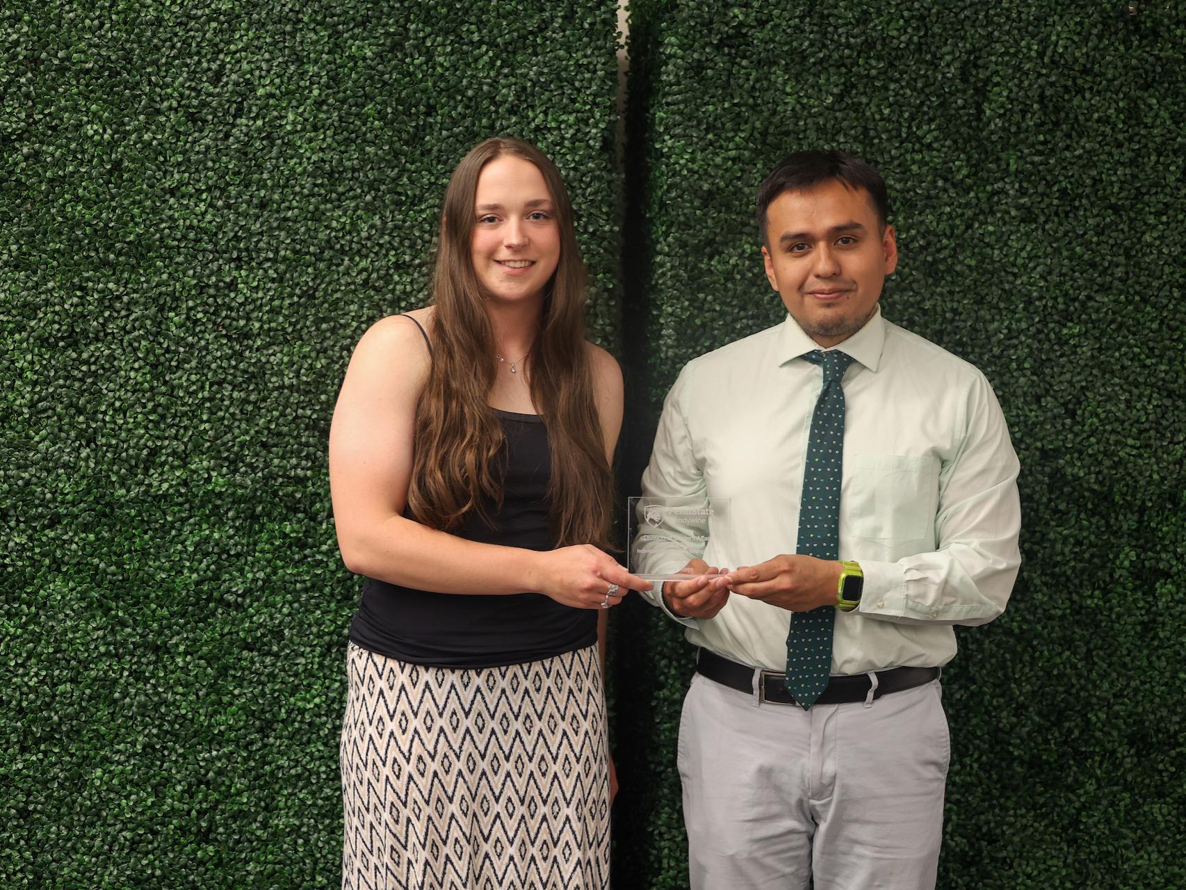 student accepting award