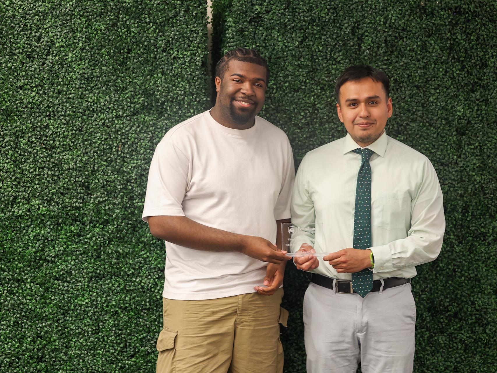 student accepting award