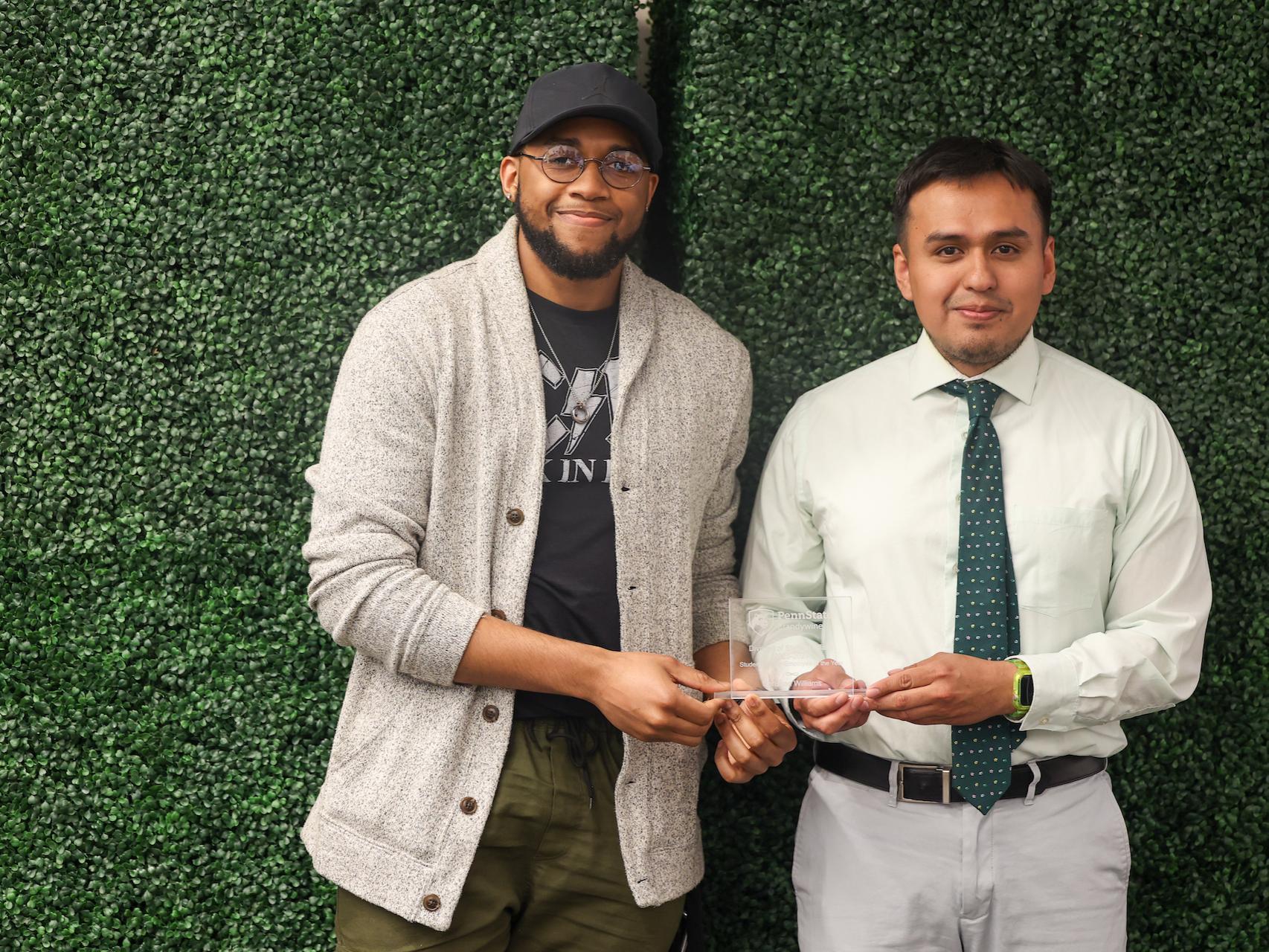 student accepting award