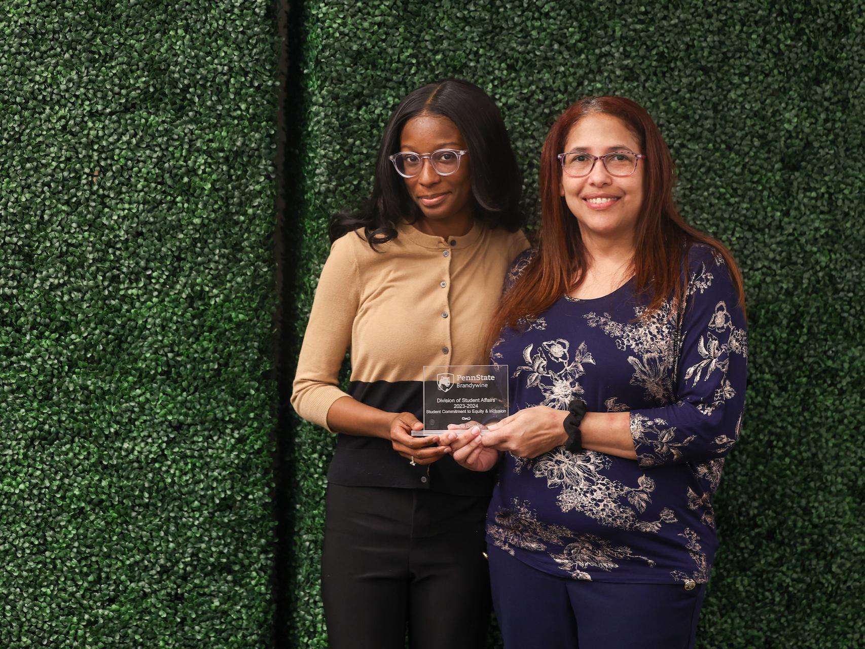 student accepting award