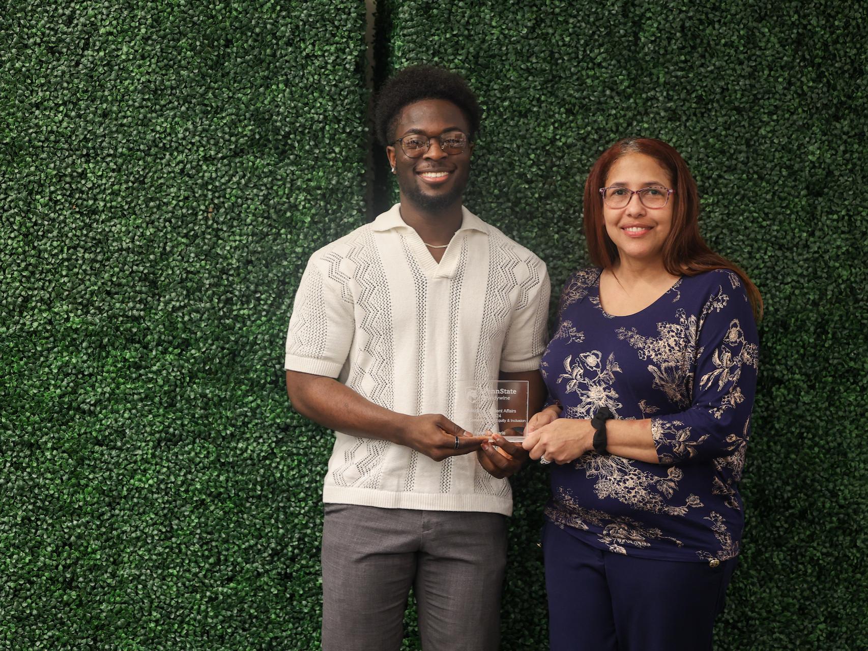 student accepting award