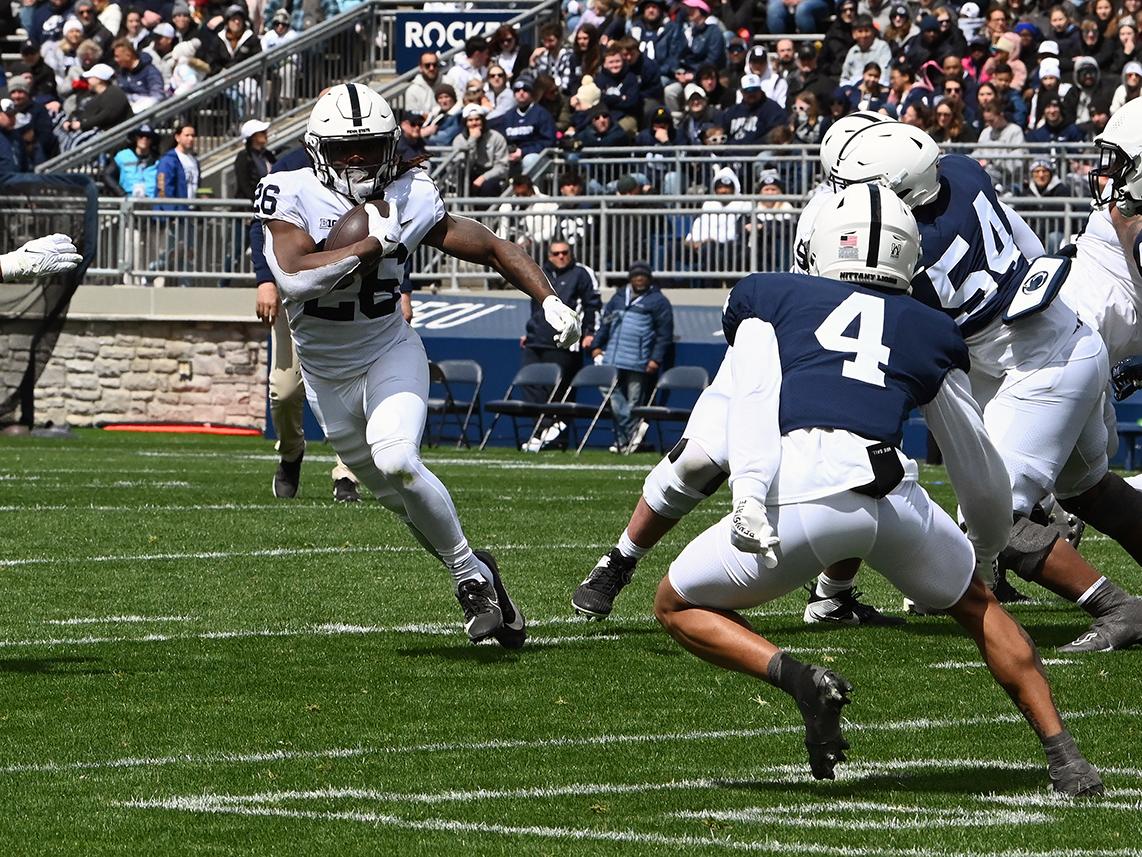 Running back rushing the ball