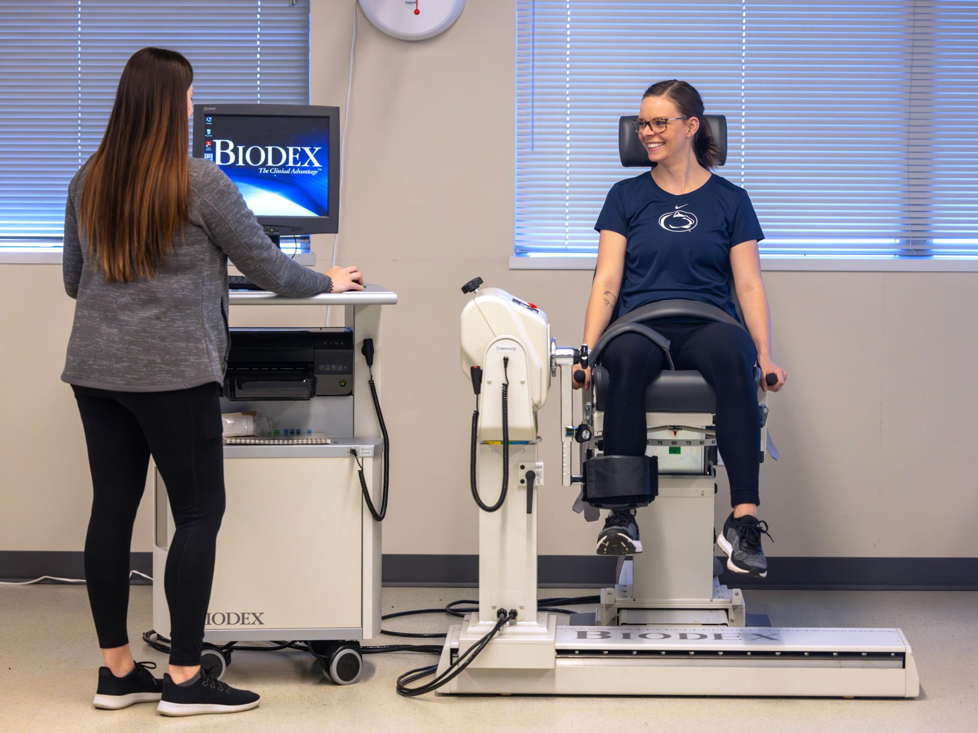 Patient uses the Biodex machine to measure the force output of muscles using isokinetic testing