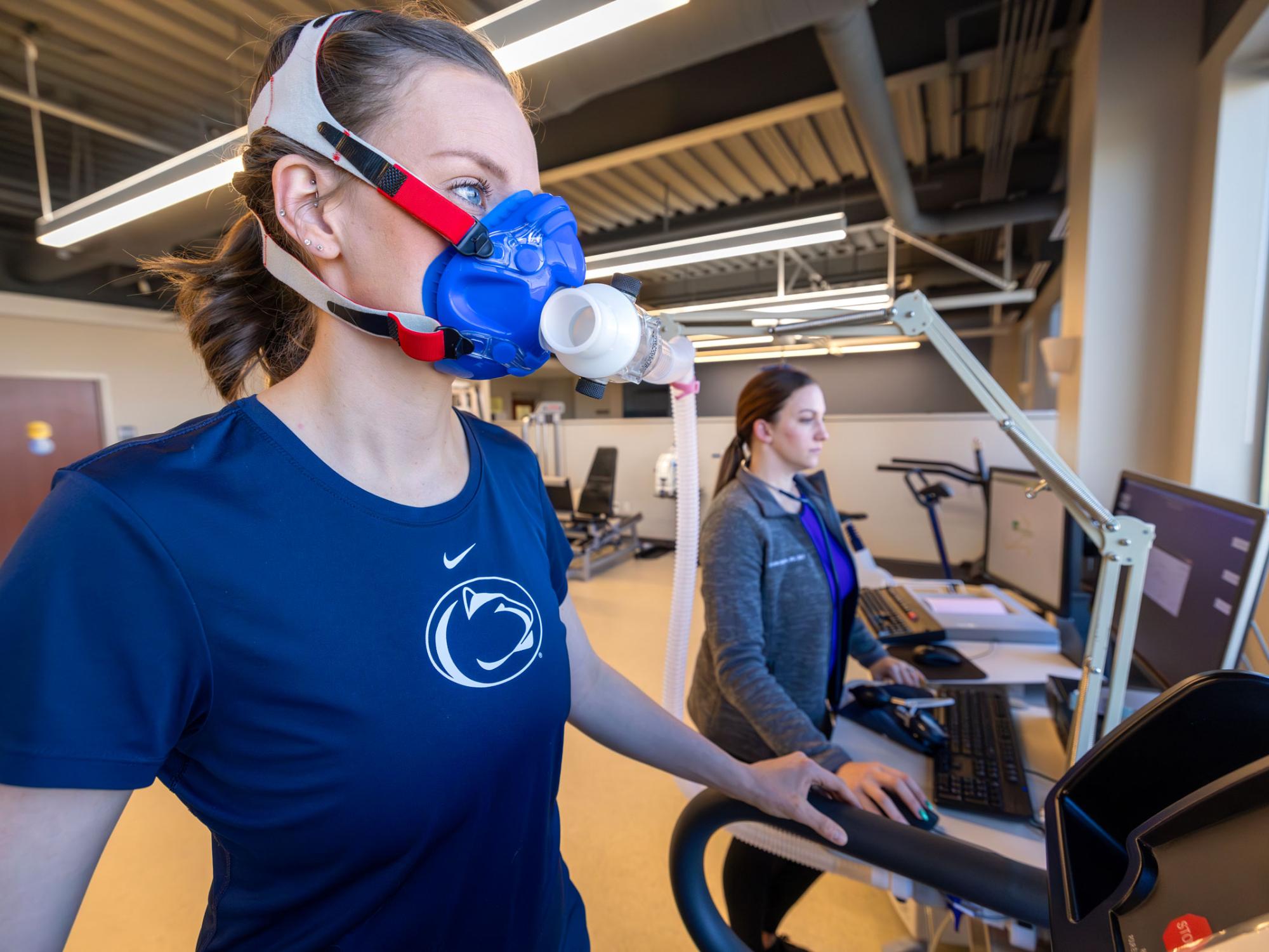 A patient conducts a VO2 max test on the treadmill to measure maximal oxygen consumption