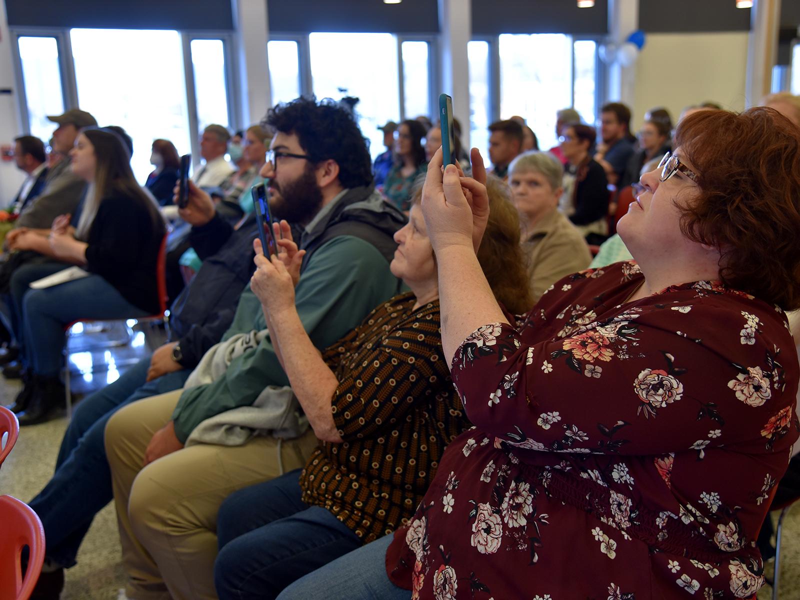 Proud families support their sons and daughters during the induction ceremony. 
