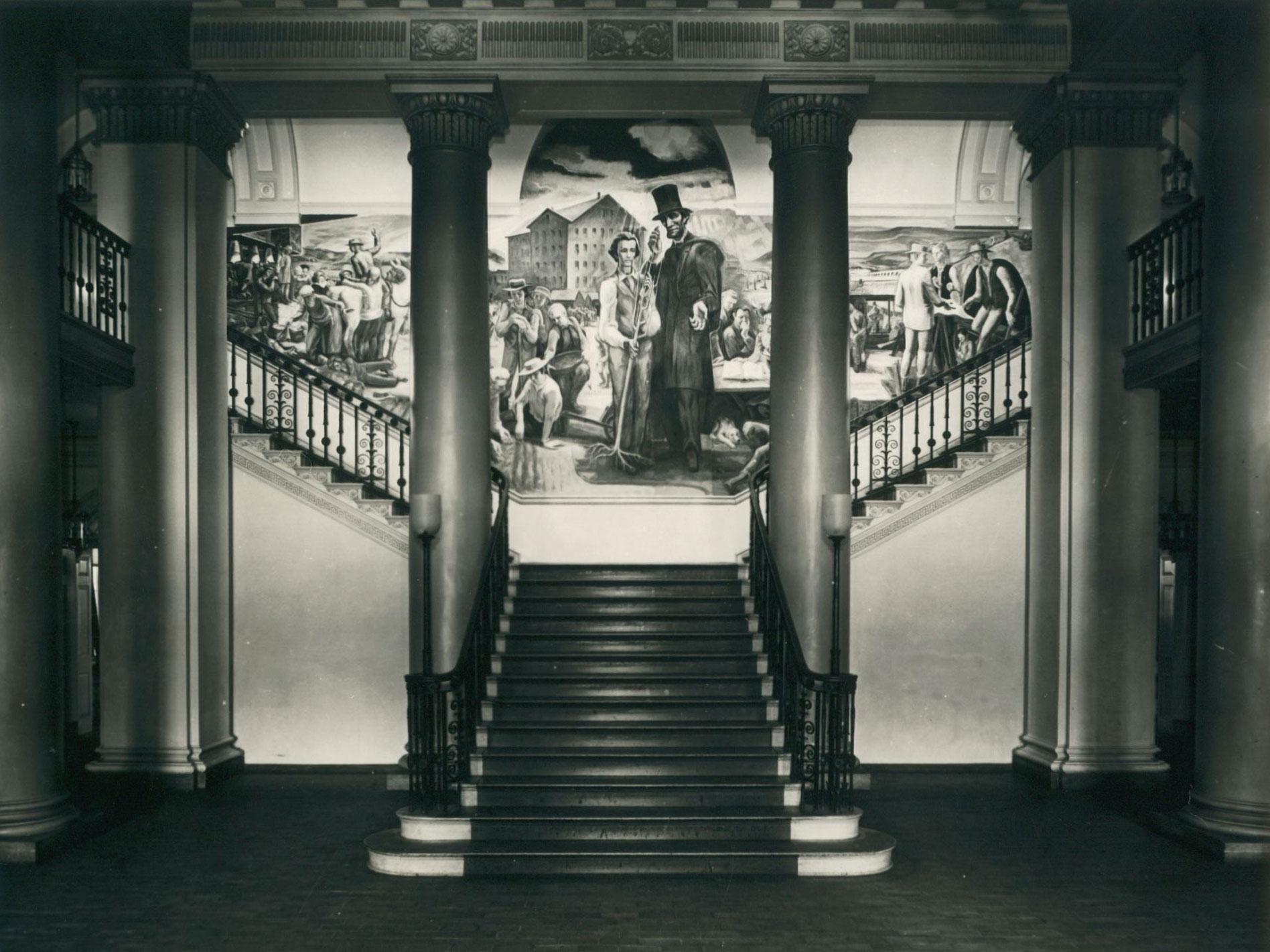 The foyer of Old Main, decorated with murals of the University's history.