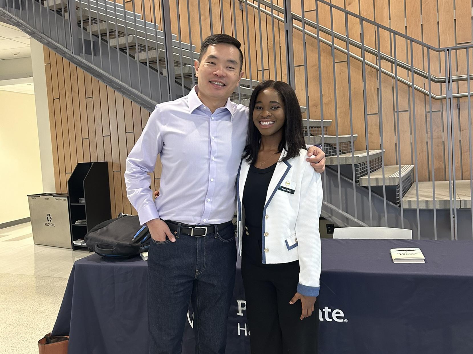Mary Odei poses with author Jia Jiang