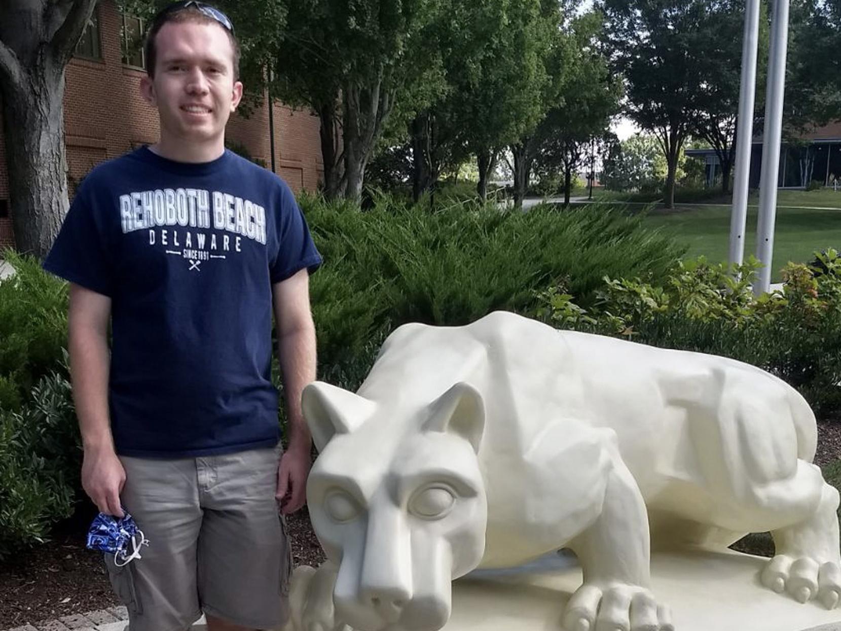 Nick Spohn with Lion Shrine at Penn State Harrisburg