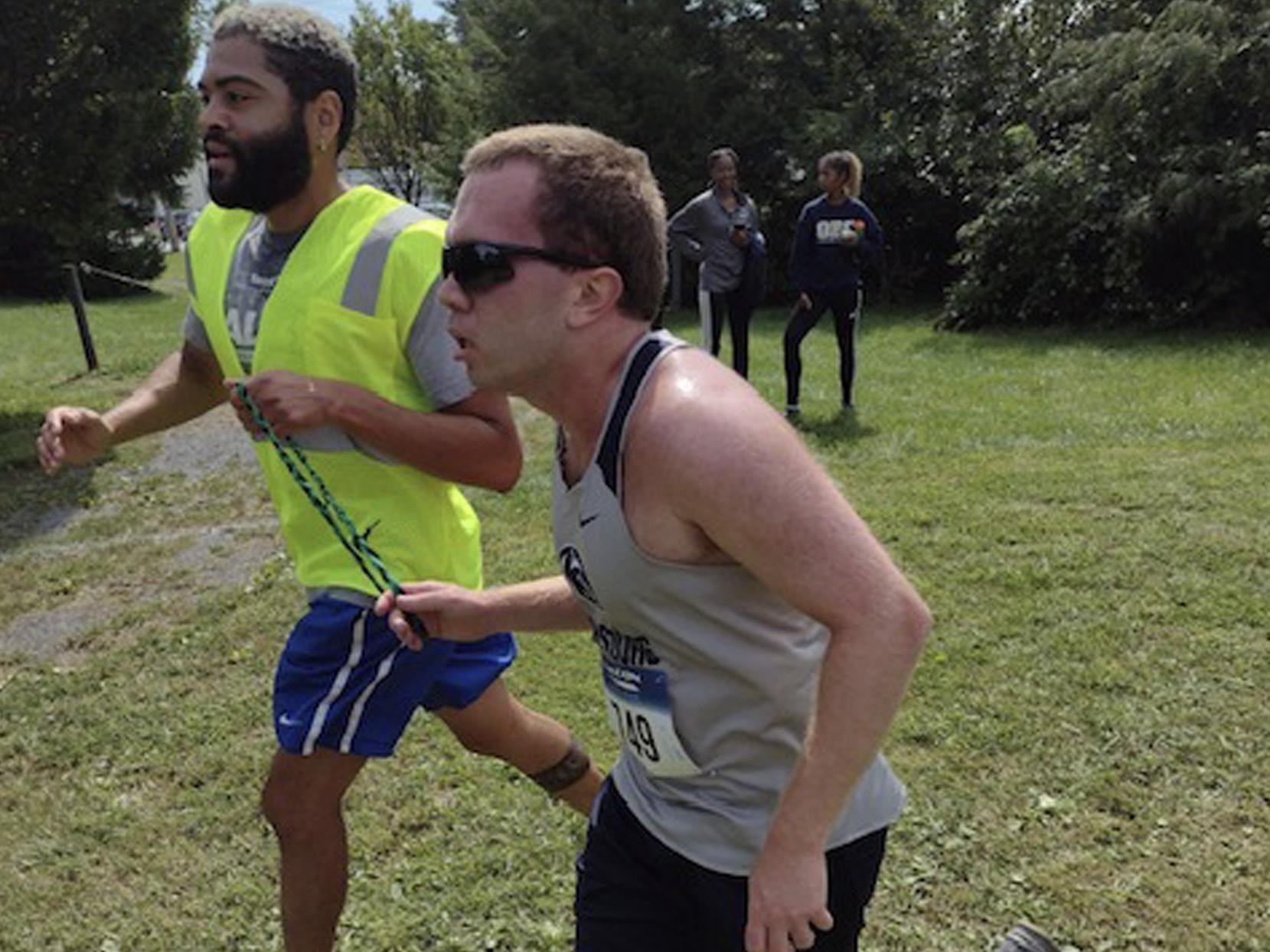Nick Spohn running cross country race fall 2021 with guide runner Luis Cruz