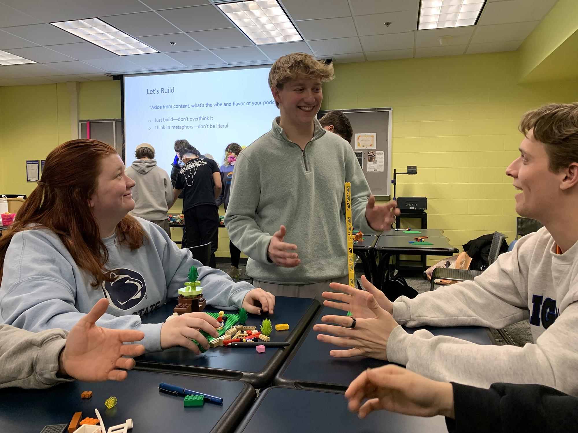 Students building with Lego blocks