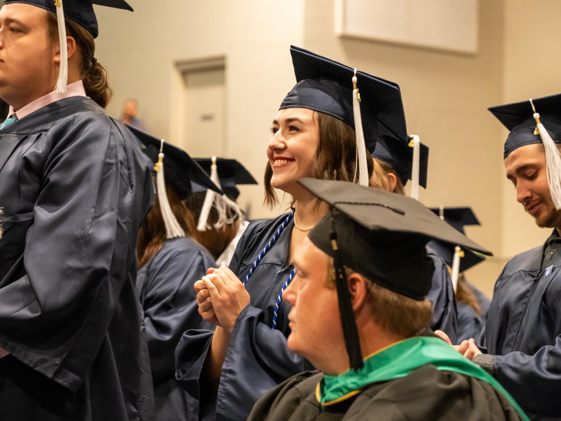 Penn State graduates celebrating commencement at the Fayette Campus.